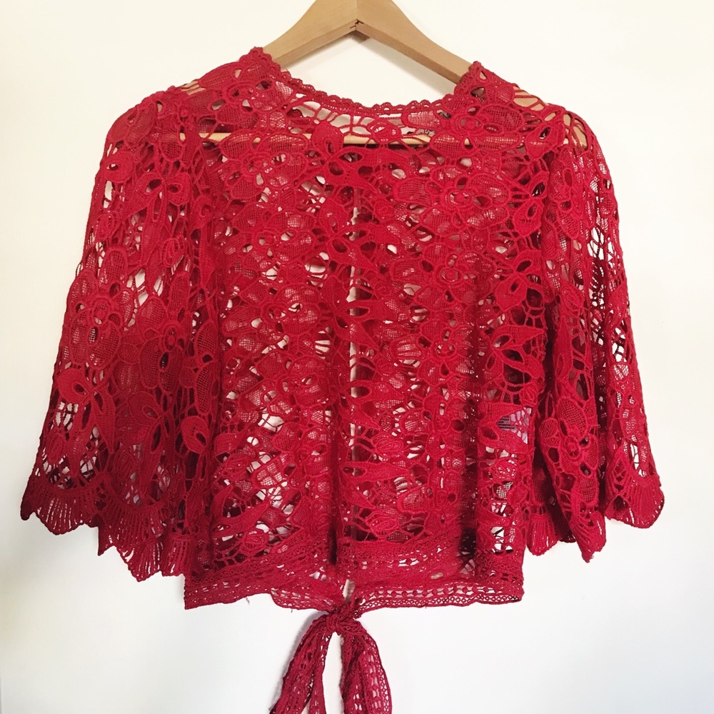 Red crochet type blouse